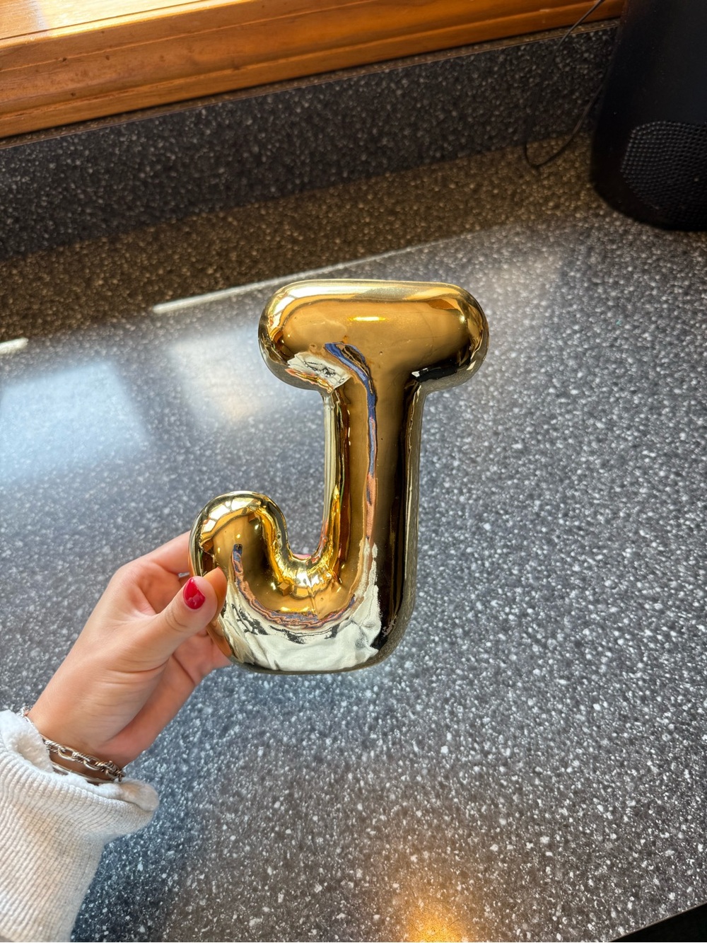 Gold letter J accessory
